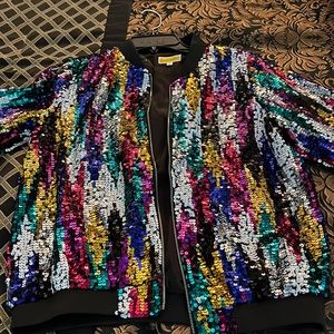 Multi color thin jacket. Very cute. Never has been wore